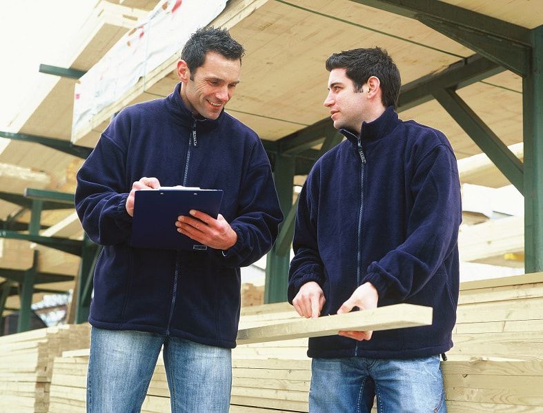 Two boys wearing jackets